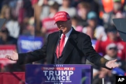 Republican presidential nominee former President Donald Trump speaks at a campaign rally in Lititz, Pennsylvania, Nov. 3, 2024.