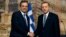 Greece's Prime Minister Antonis Samaras (L) and his Turkish counterpart Tayyip Erdogan shake hands during their meeting in Istanbul, March 4, 2013. 