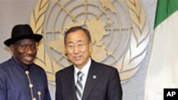 Ban Ki-moon, right, Secretary General of United Nations greets Goodluck Jonathan, President of Nigeria, left, during the 66th U.N. General Assembly at UN Headquarters.