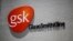 The logo of GlaxoSmithKline (GSK) is seen on its office building in Shanghai, China,July 12, 2013. 
