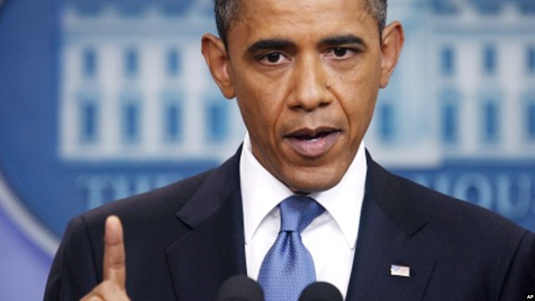 U.S. President Barack Obama makes a point during a news conference on debt negotiations with the U.S. Congress in the briefing room of the White House in Washington, July 11, 2011.