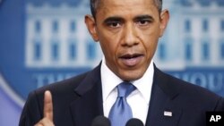 U.S. President Barack Obama makes a point during a news conference on debt negotiations with the U.S. Congress in the briefing room of the White House in Washington, July 11, 2011.