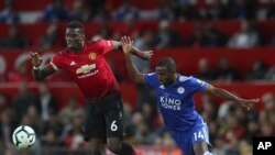Dan wasan Man U. Paul Pogba, yana murnar cin kwallo.