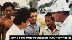 2019 World Food Prize Laureate Mr. Simon N. Groot working with farmers