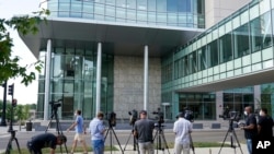 TV cameras are set up outside the Lake County courthouse for the extradition hearing for Kyle Rittenhouse Aug. 28, 2020, in Waukegan, Illinois.