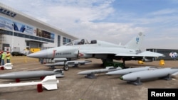 FILE - China's FTC-2000G combat aircraft is on display in Zhuhai, Guangdong province, China, Nov. 1, 2018. 