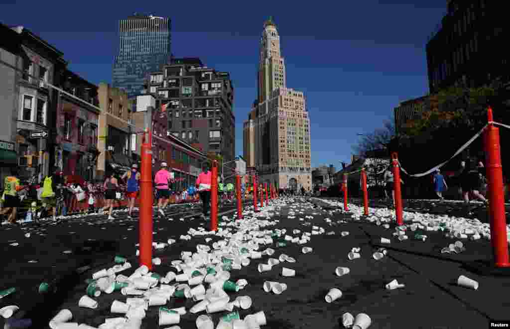 Empty cups are seen in the Brooklyn borough of New York City during the 2024 TCS New York City Marathon.