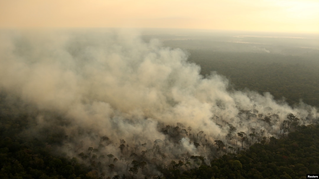 Smoke billows during a fire in an area of the Amazon rainforest near Porto Velho, Rondonia State, Brazil, Sept. 10, 2019.