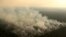 Smoke billows during a fire in an area of the Amazon rainforest near Porto Velho, Rondonia State, Brazil, Sept. 10, 2019.