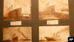 FILE - Photographs of the Titanic are displayed in a family album at the Transport museum in Belfast, Northern Ireland, Oct. 14, 2014.