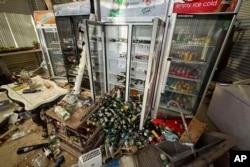 Goods are strewn about inside a Port Vila building damaged in a powerful earthquake, Dec. 17, 2024, in Vanuatu.