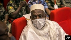 Former Defense Minister and retired Col. Maj. Bah N'Daw waits to be sworn into the office of transitional president at a ceremony in the capital Bamako, Mali, Sept. 25, 2020.