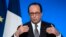 French President Francois Hollande delivers a speech at the Elysee Palace in Paris, July 23, 2014. 