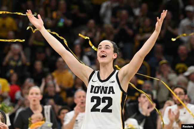 FILE - Caitlin Clark (22) reacts after the game against Ohio State. Clark broke the NCAA basketball all-time scoring record during the second quarter. (Jeffrey Becker-USA TODAY Sports)