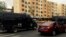 Police vehicles of the Special Weapons and Tactics (SWAT) team are seen after a blast occurred, on a road in Urumqi, Xinjiang Uighur Autonomous Region, May 22, 2014.