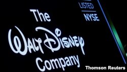 FILE PHOTO: A screen shows the trading info for the Walt Disney Company company on the floor of the NYSE in New York