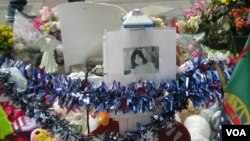 A temporary memorial for Chinese student Lu Lingzi was established in Boston's Copley Square shortly after her death.