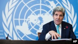 Secretary of State John Kerry gestures during a news conference after he delivered remarks to the United Nations Human Rights Council in Geneva, March 2, 2015.