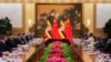 Rais wa Uganda Yoweri Museveni wa pili kulia na Rais wa China Xi Jinping wa pili kushoto walipokutana kwenye Ukumbi wa Great Hall of the People, Juni 25, 2019, Beijing. (Nicolas Asfouri/ AP)