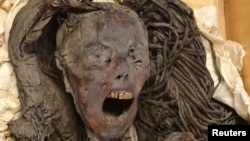 The face of the "Screaming Woman" mummy is seen at the Egyptian Museum in Cairo, Egypt, January 18, 2023 in this handout photograph released on August 2, 2024. (Sahar Saleem/Handout via REUTERS)