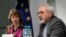 EU foreign policy chief Catherine Ashton listens as Iranian Foreign Minister Mohammad Javad Zarif (R) speaks during a news conference at the end of the Iranian nuclear talks in Geneva, Switzerland, Nov. 10, 2013.