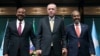 FILE - Turkish President Recep Tayyip Erdogan poses with Somali President Hassan Sheikh Mohamud and Ethiopian Prime Minister Abiy Ahmed in Ankara, Turkey, on Dec. 11, 2024. Mohamud made a visit to Ahmed in Ethiopia on Jan. 11, 2025. (Presidential Press Office via Reuters)