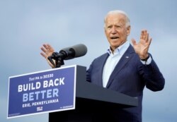 FILE - U.S. Democratic presidential candidate Joe Biden speaks during a campaign event at United Association (UA) Plumbers Local 27 in Erie, PA, Oct. 10, 2020.