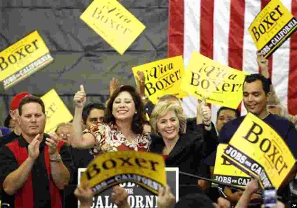 U.S. Secretary of Labor Hilda Solis, left, and U.S. Sen. Barbara Boxer, D-Calif. address get-out-the-vote volunteers at the International Association of Firefighters Local 1014, 31 Oct. 2010, in El Monte, California