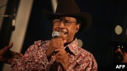 FILE - Lonnie Brooks performs at the Pritzker Pavilion stage in Chicago, Illinois, Nov. 27, 2012.