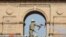 A firefighter sprays disinfectant in front of the India Gate during a nationwide lockdown as a preventive measure against COVID-19 in New Delhi on April 17, 2020.