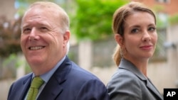 John Feinblatt, president of Everytown for Gun Safety, left, and Shannon Watts, founder of Moms Demand Action for Gun Sense in America, pose for a photograph in Washington, April 26, 2017. 