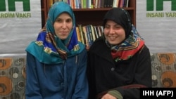 Two young Czech women, Antonie Chrastecka, left, and Hana Humpalova, kidnapped in Pakistan in 2013, have been freed and have returned home, Prime Minister Bohuslav Sobotka said, March 28, 2015.