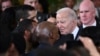 US President Joe Biden greets attendees during a reception in recognition of Black History in the East Room of the White House on Feb. 6, 2024. 