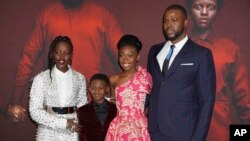 Lupita Nyong'o, Evan Alex, Shahadi Wright Joseph dan Winston Duke menghadiri pemutaran perdana film horor "Us" di New York, 19 Maret 2019. (Foto: AP)