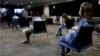 Children wait 15 minutes after receiving there first dose of the Pfizer Covid-19 vaccine at the Beaumont Health offices in Southfield, Michigan, Nov. 5, 2021. 