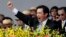 Taiwan's President Ma Ying-jeou cheers with the audience during National Day celebrations in front of the Presidential Office in Taipei, Taiwan, Oct. 10, 2013.