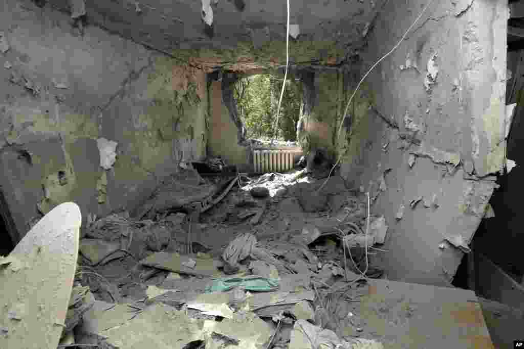 A damaged apartment is seen after shelling in Donetsk, eastern Ukraine, Aug. 13, 2014.