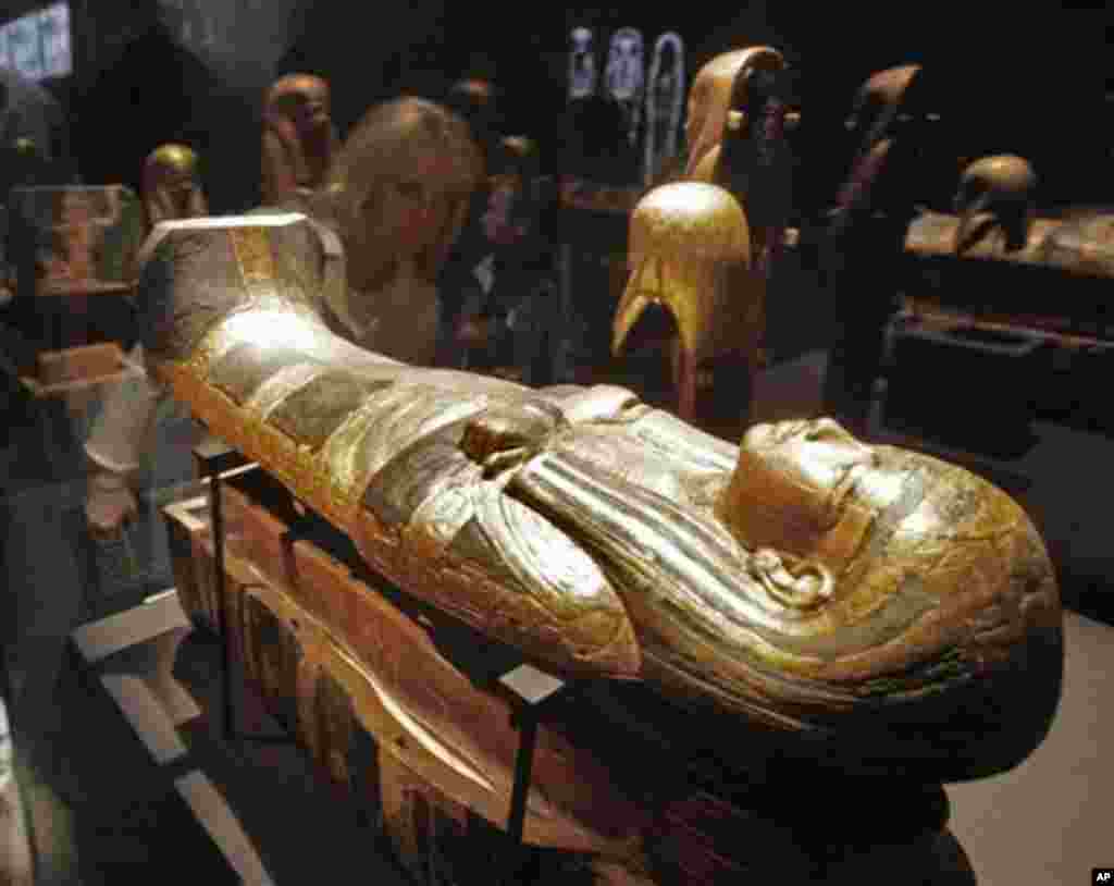 A "Nested Fetus Coffin," is displayed as part of the "Tutankhamun and the Golden Age of the Pharoahs" exhibit in New York, Wednesday, April 21, 2010. The boy king stirred a sensation in New York City 31 years ago. This time, a Times Square exhibition cont