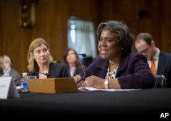 FILE - Then-Assistant Secretary of State for African Affairs Linda Thomas-Greenfield, right, testifies during a Senate Foreign Relations Committee hearing on Capitol Hill in Washington, Jan. 9, 2014.