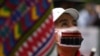 FILE - An indigenous woman takes part in a protest to demand the resignation of Guatemalan President Alejandro Giammattei, in Guatemala City, Nov. 24, 2020.