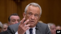 FILE - Robert F. Kennedy Jr., U.S. President Donald Trump's nominee to serve as secretary of health and human services, testifies at a Senate committee hearing, Jan. 30, 2025, in Washington. The Senate on Feb. 13, 2025, confirmed Kennedy to the position.