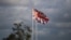 This photograph taken on Dec. 10, 2021, shows the Britain flags wave, in the harbor of Ouistreham, northwestern France. 