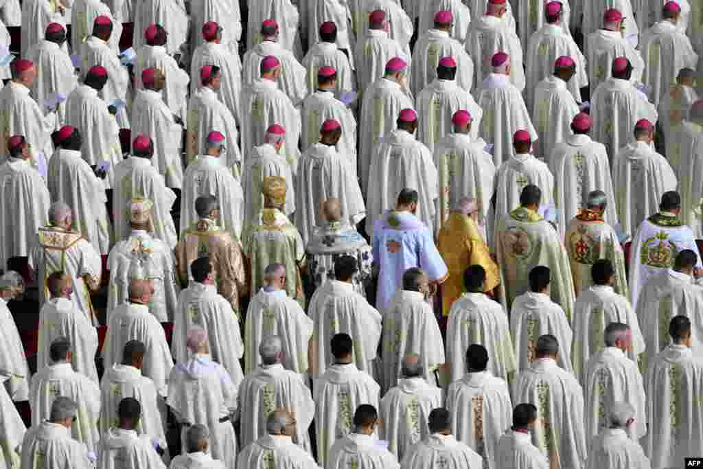 Prelates attend a Holy Mass for the opening of the Ordinary General Assembly of the Synod of Bishops at St. Peter&#39;s square in The Vatican.