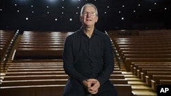 In this photo provided by Apple Inc., CEO Tim Cook delivers the keynote address during the 2020 Apple Worldwide Developers Conference Monday, June 22, 2020, in Cupertino, Calif. (Brooks Kraft/Apple Inc. via AP)