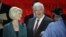 Former House Speaker Newt Gingrich and his wife Callista look over the podium during a sound check at the Republican National Convention in Tampa, Florida, August 28, 2012.