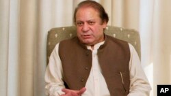 Pakistan's Prime Minister Nawaz Sharif speaks during a meeting in Islamabad, June 8, 2013. 