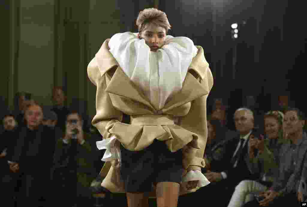 A model wears a creation as part of Viktor &amp; Rolf Haute Couture Spring Summer 2025 collection, presented in Paris.