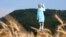 Life-size wooden sculpture of U.S. first lady Melania Trump is officially unveiled in Rozno, near her hometown of Sevnica, Slovenia, July 5, 2019.