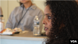 FILE - Rana Ayyub speaking at a conference in Washington D.C.