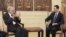 In this photo released by the Syrian official news agency SANA, Syrian President Bashar Assad, right, meets with the U.N.-Arab League envoy Lakhdar Brahimi, in Damascus, September 15, 2012. 